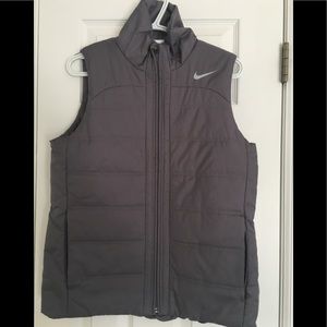 Nike Women’s grey puffy vest.